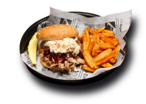 Pulled Pork Sandwich - Our slow smoked pulled pork served on a bun.